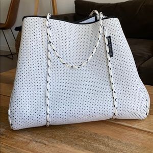Large white state of escape tote